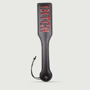 Domme Series Paletă din piele cu decupaj BITCH - negru
