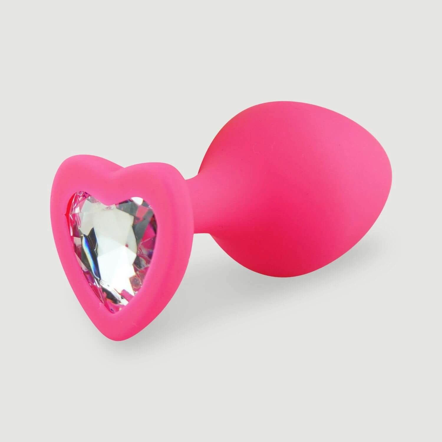 Anal Collection – Mittlerer Analplug aus Silikon mit herzförmigem Schmuckstein – Rosa/Transparent