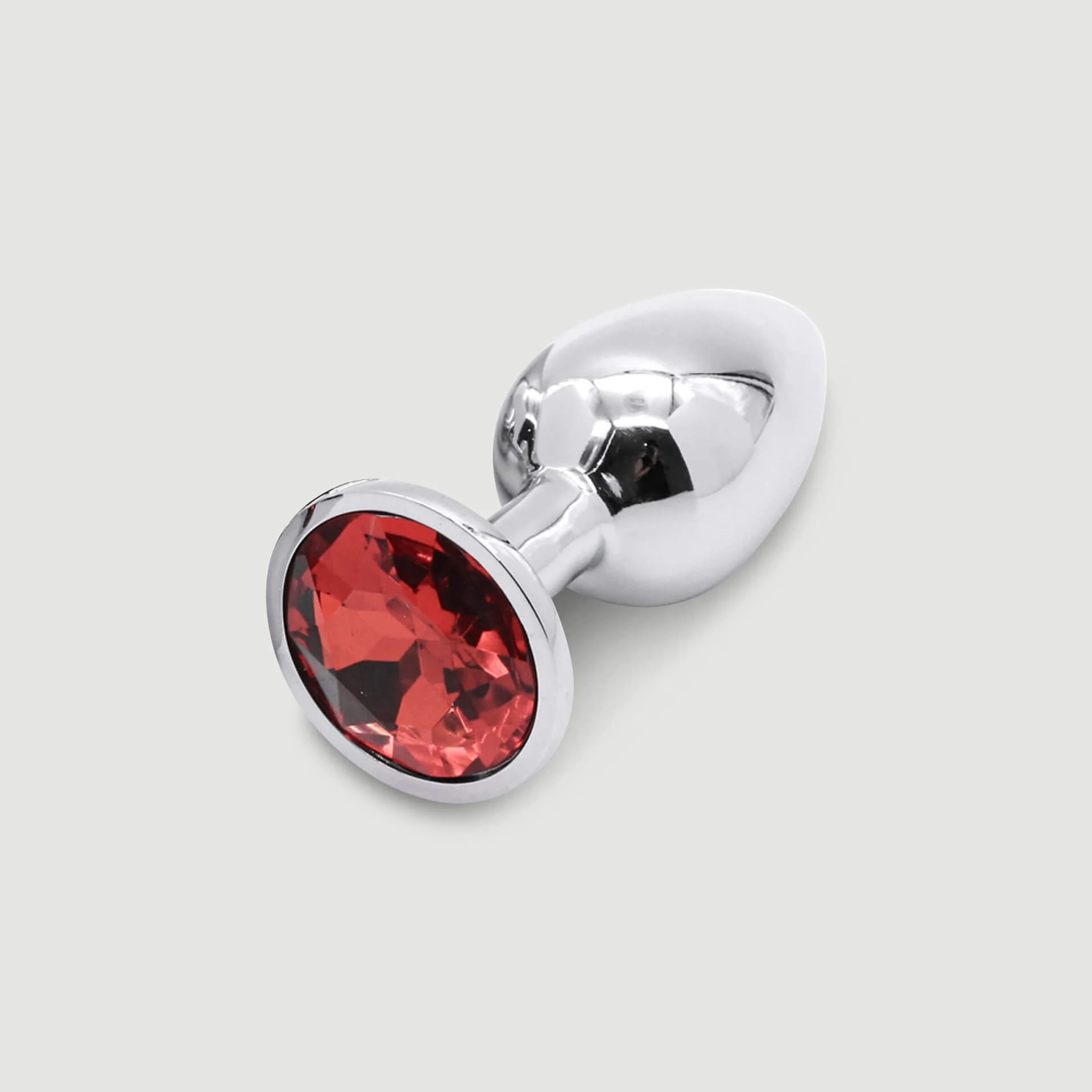 Anal-Plug „Collection Medium“ aus Metall mit rundem Schmuckstein – Silber/Rot